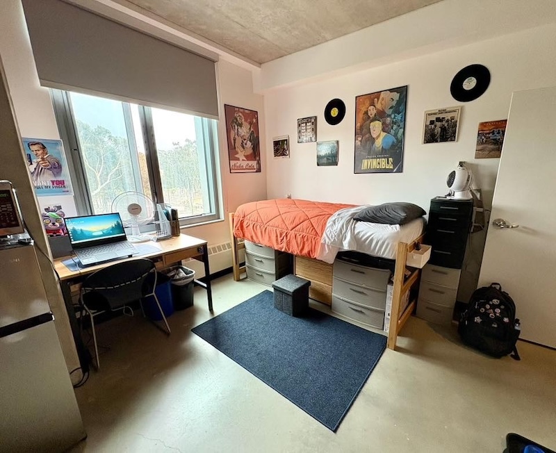 Boy dorm room decor inspiration with dorm desk and dorm mini fridge